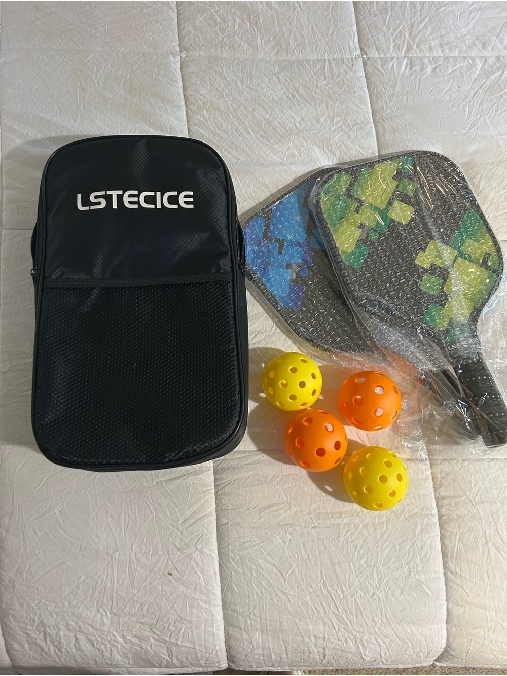 Black Pickleball Paddle Set with Yellow & Orange Balls